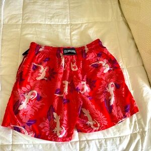 Vilebrequin men’s swimming trunks in a bright coral with lizard print